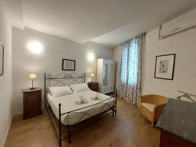 Letto o letti in una camera di Little Palm apartment