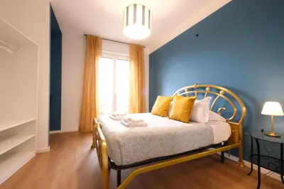 Letto o letti in una camera di Wine Apartments Florence Cabernet