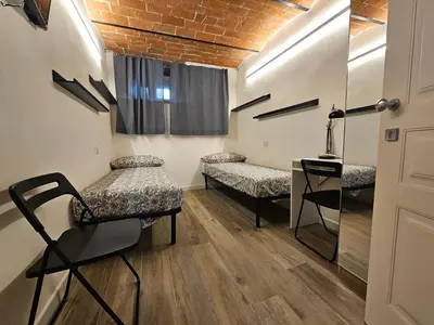Letto o letti in una camera di Pan