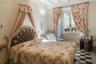 Letto o letti in una camera di Corte dei Neri Residenza d'Epoca