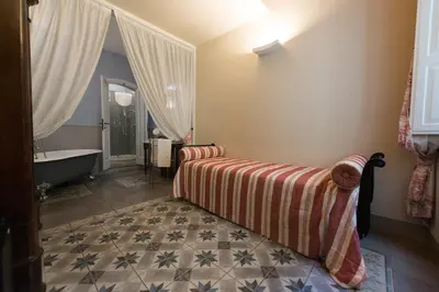 Letto o letti in una camera di Corte dei Neri Residenza d'Epoca