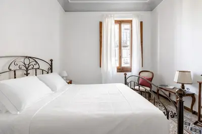 Letto o letti in una camera di Florence Homestay