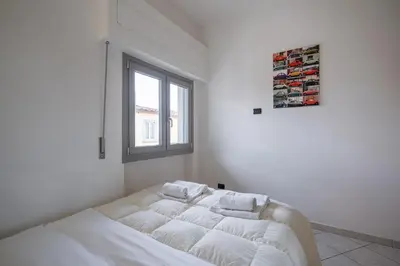 Letto o letti in una camera di GuestHost - The Sky Of Florence - Orti Oricellari Apartment