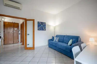 Area soggiorno di GuestHost - The Sky Of Florence - Orti Oricellari Apartment