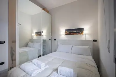 Letto o letti in una camera di GuestHost - The Sky Of Florence - Orti Oricellari Apartment