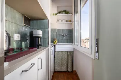 Cucina o angolo cottura di Magnolia Suite by Maison Florence