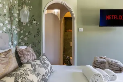 Letto o letti in una camera di Magnolia Suite by Maison Florence