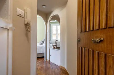 Letto o letti in una camera di Magnolia Suite by Maison Florence