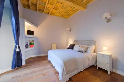 Letto o letti in una camera di Duomo Exclusive Apartment