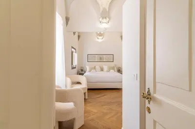 Letto o letti in una camera di La Casa di Liszt - Luxury Suites
