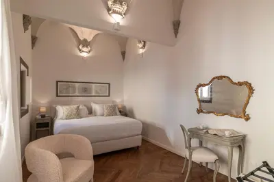 Letto o letti in una camera di La Casa di Liszt - Luxury Suites