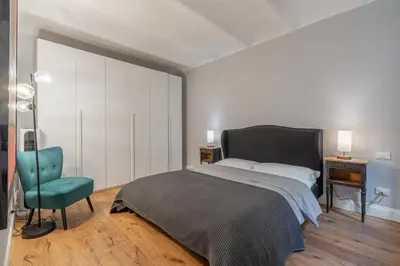Letto o letti in una camera di Appartamento nel centro di Firenze sul fiume Arno