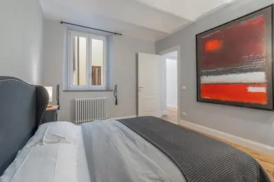 Letto o letti in una camera di Appartamento nel centro di Firenze sul fiume Arno