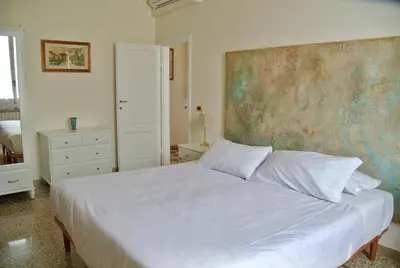 Letto o letti in una camera di Vintage Petrella relax e atmosfera fiorentina