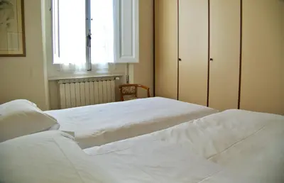 Letto o letti in una camera di Vintage Petrella relax e atmosfera fiorentina
