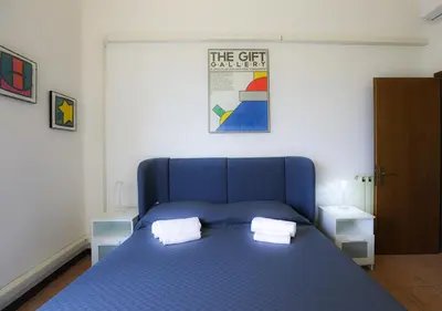 Letto o letti in una camera di Dimora Rebecca - Near City Center