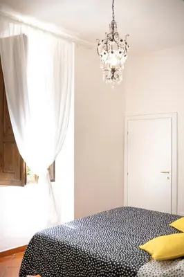 Letto o letti in una camera di Residenza Moore