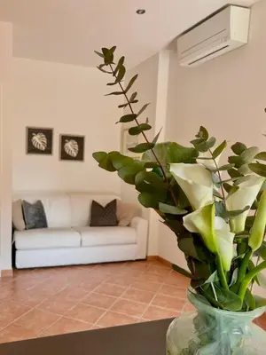 Area soggiorno di Le tre orchidee Apartments