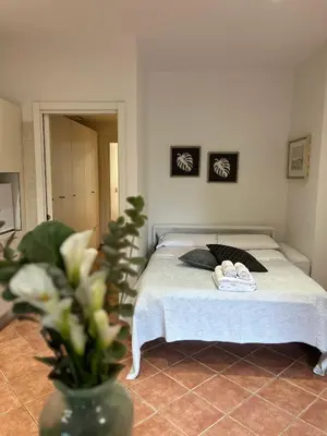 Letto o letti in una camera di Le tre orchidee Apartments