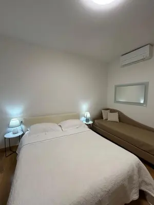 Letto o letti in una camera di Le tre orchidee Apartments