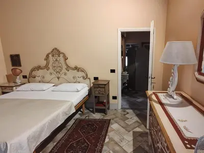 Letto o letti in una camera di Bioagriturismo Podere Ruggeri
