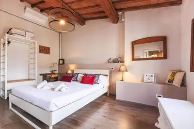 Letto o letti in una camera di Apartments Florence - Urban Spirit cozy and modern