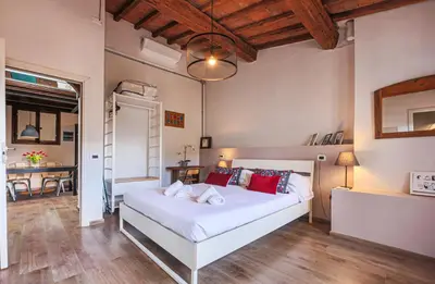 Letto o letti in una camera di Apartments Florence - Urban Spirit cozy and modern