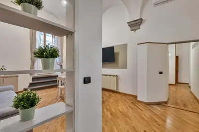 TV o dispositivi per l'intrattenimento presso Fiesolana Boutique Apartment