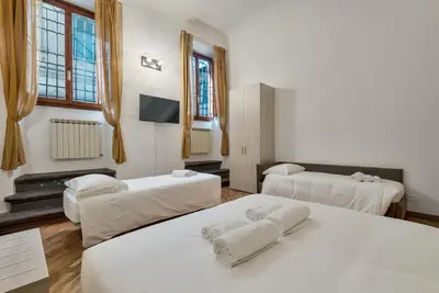 Letto o letti in una camera di Fiesolana Boutique Apartment