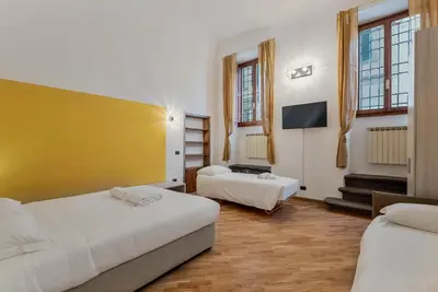 Letto o letti in una camera di Fiesolana Boutique Apartment