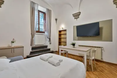 Letto o letti in una camera di Fiesolana Boutique Apartment
