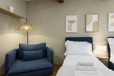 Letto o letti in una camera di Vibe Florence - Via della Chiesa 51