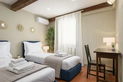 Letto o letti in una camera di Vibe Florence - Via della Chiesa 51
