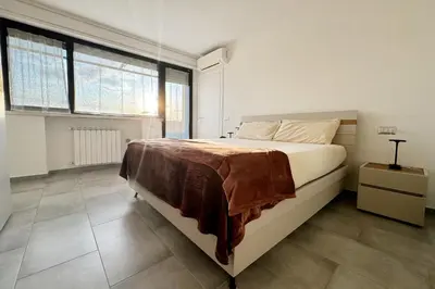 Letto o letti in una camera di Piccolo attico a Prato