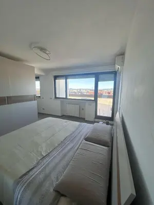 Letto o letti in una camera di Piccolo attico a Prato