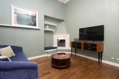 TV o dispositivi per l'intrattenimento presso Fossi Street Central Apartment