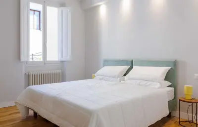 Letto o letti in una camera di Contemporary Apartment near Lungarno Cellini