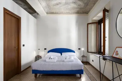 Letto o letti in una camera di UNYCA - La Loggia Florence Central