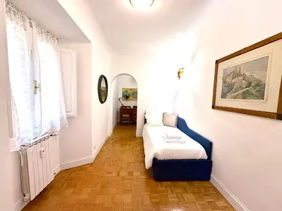 Letto o letti in una camera di Casa D'Azeglio, central Florence, quiet and elegant