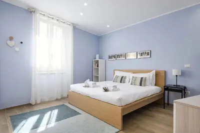 Letto o letti in una camera di UNYCA - Florence Lovely Apartment