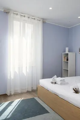 Letto o letti in una camera di UNYCA - Florence Lovely Apartment