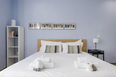 Letto o letti in una camera di UNYCA - Florence Lovely Apartment