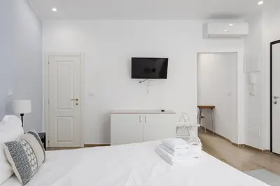 Letto o letti in una camera di UNYCA - Florence Lovely Apartment