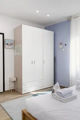 Letto o letti in una camera di UNYCA - Florence Lovely Apartment