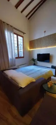 Letto o letti in una camera di Tuscan Loft - 7 Guests with Patio