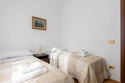 Letto o letti in una camera di Toselli Apartment By San Firenze Collection