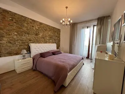 Letto o letti in una camera di A Casa di Alice