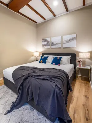 Letto o letti in una camera di Duomo Suite - Dolcevita Holiday