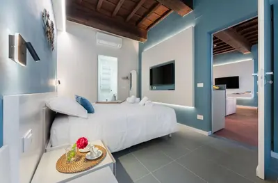 Letto o letti in una camera di Keys of Italy - Vigna 8 Blu- Newly Renovated Elegant 2 Bedr - Great Central Location in Florence