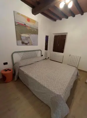 Letto o letti in una camera di Charming Little House 2 kilometers from the Historical Centre in a typical Florentine district right next to the Tram and Bus stops by Florence Holidays Apartments
